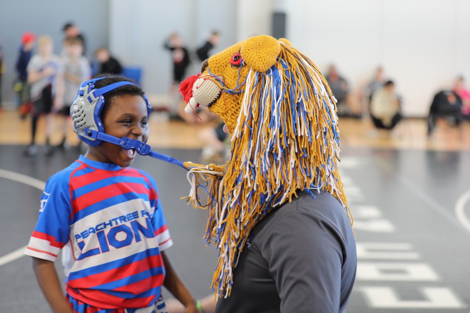 Peachtree Ridge wrestler on the mat